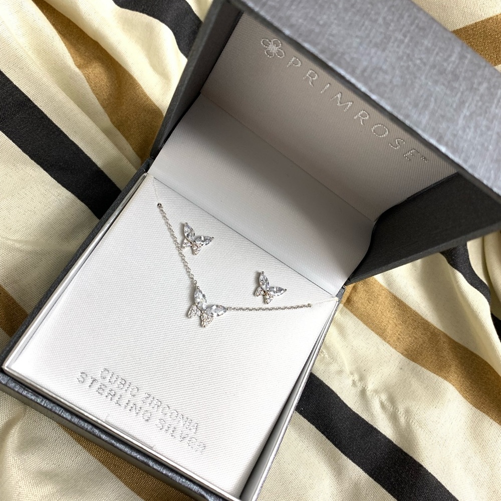 Silver buttery necklace and earring set